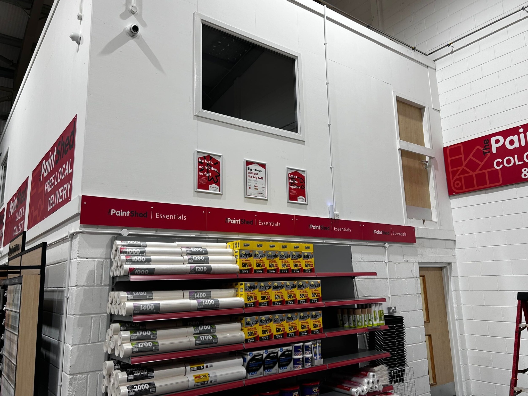 Branded product displays around the existing office block